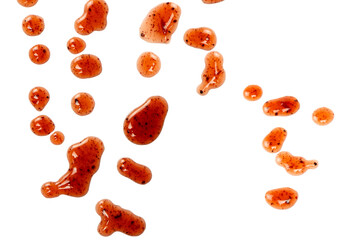 Red jam splashes isolated on a white background.