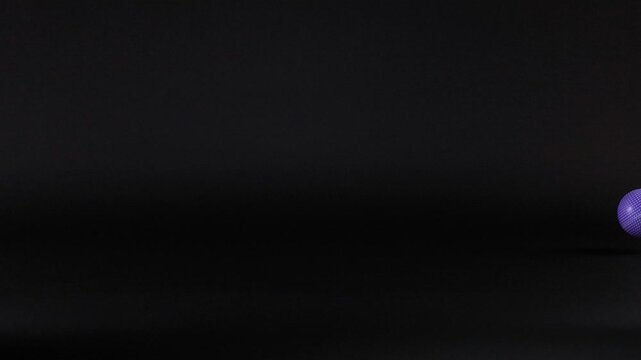 Purple Ball Bouncing in Darkness