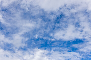 Large, high-resolution photos taken with a professional camera. Large white clouds in a dark blue sky during the rainy season, when the weather is clear, in Myanmar.