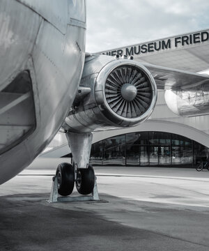 Dornier Do 31 E1 at the Dornier Museum Friedrichshafen. Close up view of fuselage, landing gear and engine nacelle, museum building in the background. Friedrichshafen, Germany - September 25 2019.