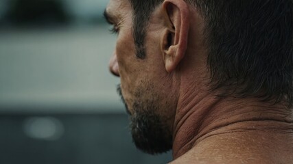 Fototapeta premium Back view of man's head with healthy skin and hair