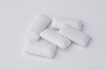 Chewing gum pads. Pellet chewing gums isolated on white. Chewing gum pads close up.