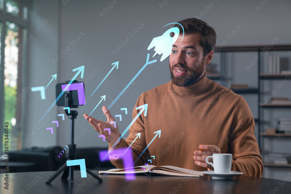 Poster man in a casual sweater recording video with digital graphics of arrows and a rocket icon.
