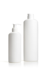 White unbranded dispenser bottle isolated on white background, cosmetic packaging mockup