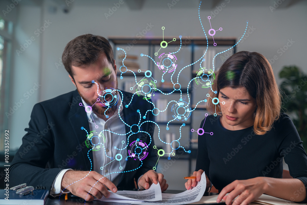 Poster two professionals analyzing documents with digital network graphics overlaying in an office setting.