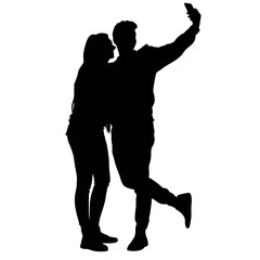 A couple standing side by side, with one person holding the phone for a selfie. The two are close together silhouette