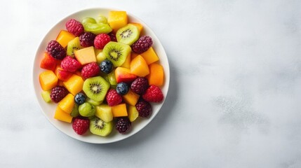 Plate of fresh fruit platter bright background clean layout  copy space