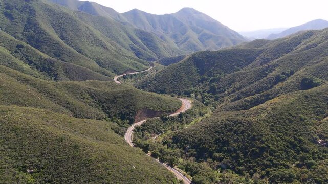 Aerial clip of the Ortega Highway 74 winding it's way through the mountains of Riverside County California USA