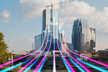 Futuristic digital arrows over Nashville skyline with modern buildings and construction crane.