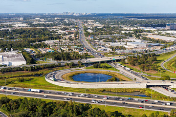 Aerial view on interstate crossing with Floridas Turnpike and Martin Andersen Beachline Expy with...
