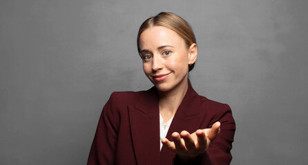smiling, looking happy, confident and friendly, offering a handshake to close a deal, cooperating
