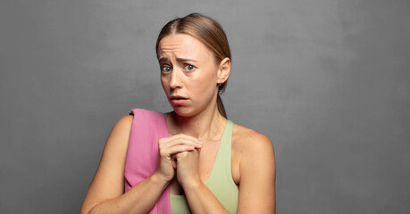 looking worried, stressed, anxious and scared, panicking and clenching teeth