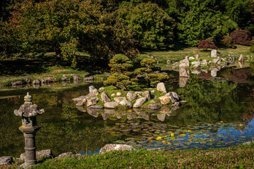 beautiful Japanese style zen garden ,in autumn ,with pond and rocks ,gardening and landscaping ,hobbies and interests