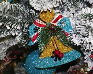An angel figurine decorates the Christmas tree.