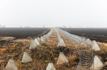 Kharkiv region fortifications. Anti-tank blocks with barbed wire
