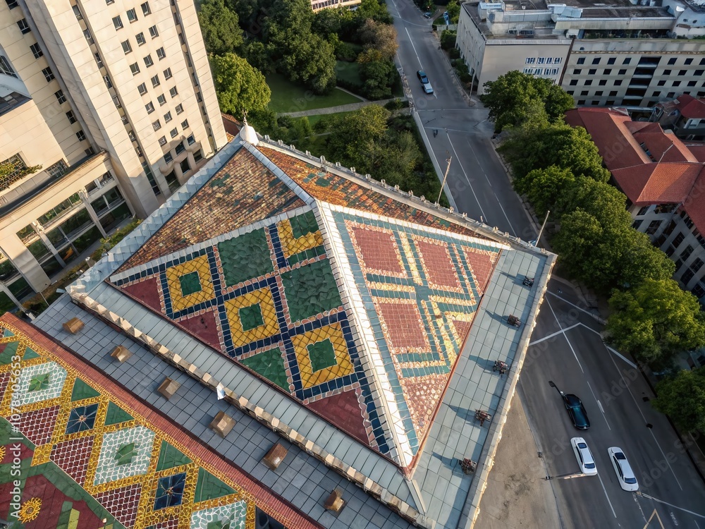 Poster aerial view of a colorful tiling pattern on a rooftop, showcasing geometric designs and textures in 