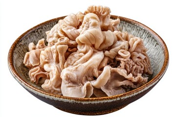 Fototapeta premium Beef and lamb stomach and intestines cut and served on a plate with cow tripe on a white background