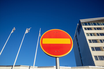 No entrance traffic sign on blue sky background