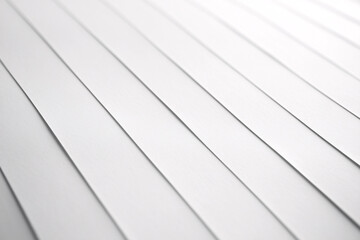 Fototapeta premium A minimalistic abstract composition of white paper sheets overlapping with soft shadows creating a clean geometric pattern 