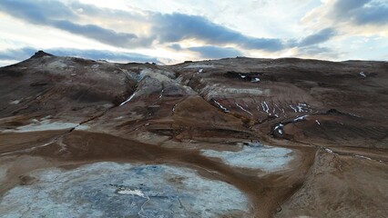 Icelandic landscape with blue lake and fumes