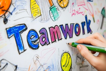 A close-up of a child's hand coloring the word 'Teamwork' on a vibrant drawing board.