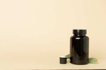 Jar with protein powder on color background. Sports nutrition concept