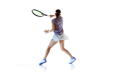 Back view photo of player in sportswear leaps, racket raised high for overhead swing against white...