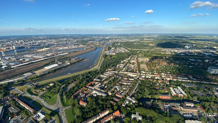Aerial View of Urban Cityscape with River and Green Spaces