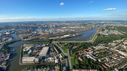 Aerial View of Vibrant Industrial Cityscape Under Clear Blue Sky