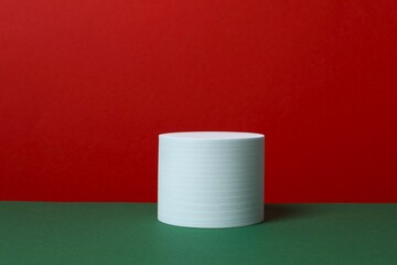 White podium on color background 
