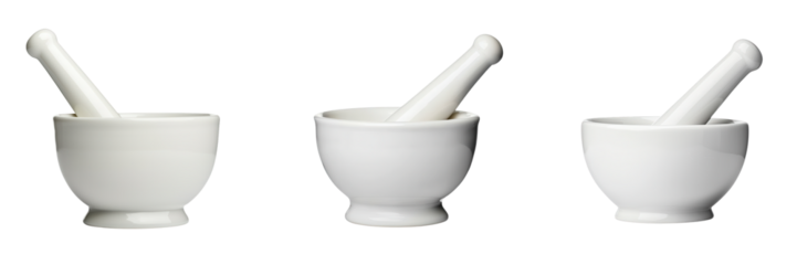 Three white mortar and pestle sets displayed together, emphasizing their smooth surfaces and classic design.