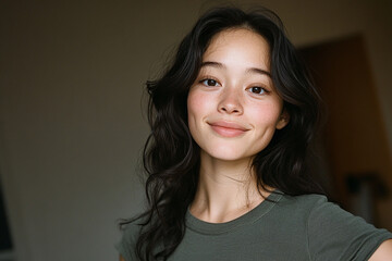 Fototapeta premium Portrait of Asian woman with radiant, glowing skin peaceful expression. focusing on her natural beauty and luminous skin.