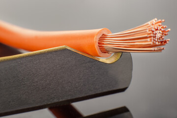 Copper Wire Cable Close Up on Cutting Blade