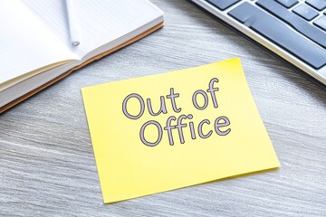 Out of Office Note on a Desk