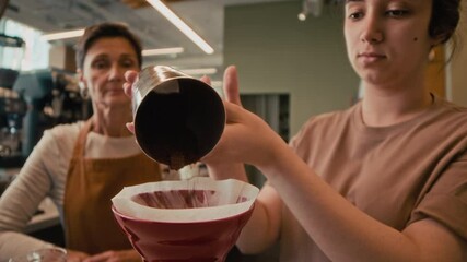 No people shot of wine glasses and wessels for coffee on shelf in modern coffee shop of cafe - Powered by Adobe