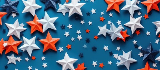 Obraz premium Red, white, and blue paper stars on blue background.
