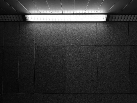 Elegant dark empty granite wall with spotlight