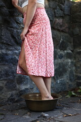 woman standing on the rocks