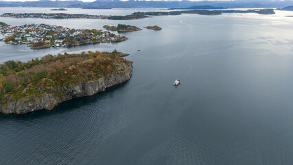 Ferry Navigating Through Serene Fjord