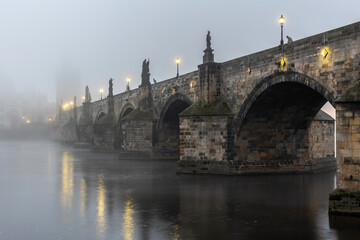 Charles bridge in foggy morning. ( Karluv most v ranni mlze) Prague