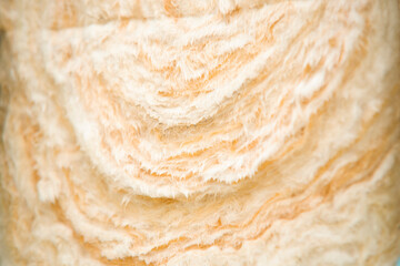 Close-up view of textured rockwool insulation roll