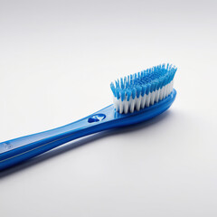 clean blue toothbrush, isolated on a white background