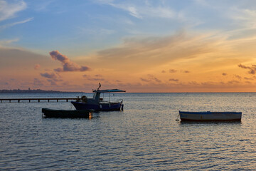 sunset time on the Stagnone of Marsala, in Sicily in the province of Trapani