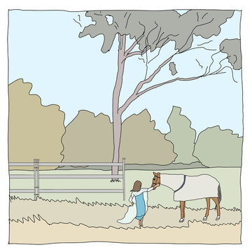 Young girl in dress up costume leading horse in paddock with trees in background