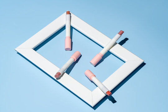 Lipstick and swatches theme in a geometric display