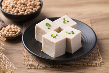 Fresh tofu with soy bean seeds, Vegan food ingredient in Asian cuisine, Plant based diet