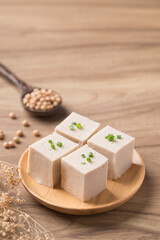 Fresh tofu with soy bean seeds, Vegan food ingredient in Asian cuisine, Plant based diet
