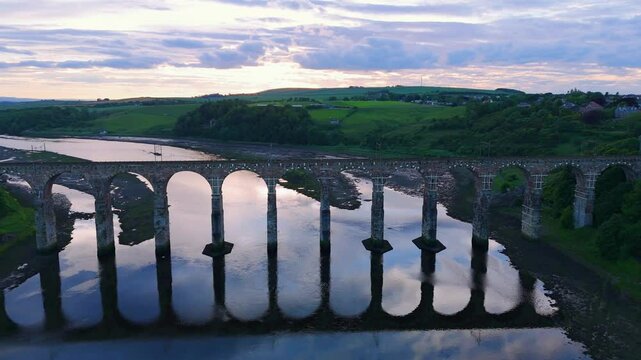 Berwick, Northumberland, UK, June 19, 2024; sunset aerial fly over clip of the Royal Border Bridge Viaduct, Berwick, Berwick-upon-Tweed, Northumberland, England, UK.