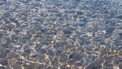Waves On The Beach. Clear Water Of The Sea Surf And Pebble Beach.