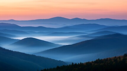 Fototapeta premium Layered Mountains at Dawn with Mist